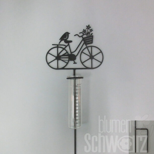 Fahrrad mit Regenmesser am Stab